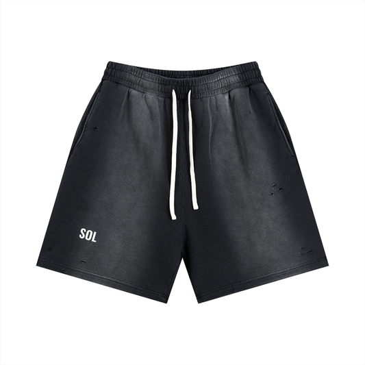 SOL Sun Fade Distressed Shorts — sun-faded distressed cotton shorts, front view