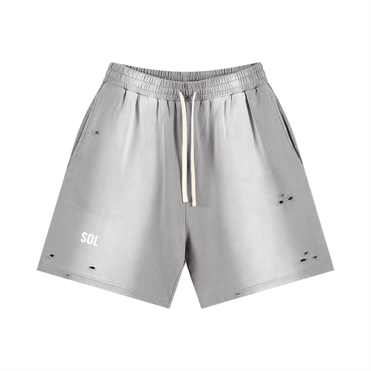SOL Sun Fade Distressed Shorts — ripped edge and pocket detail