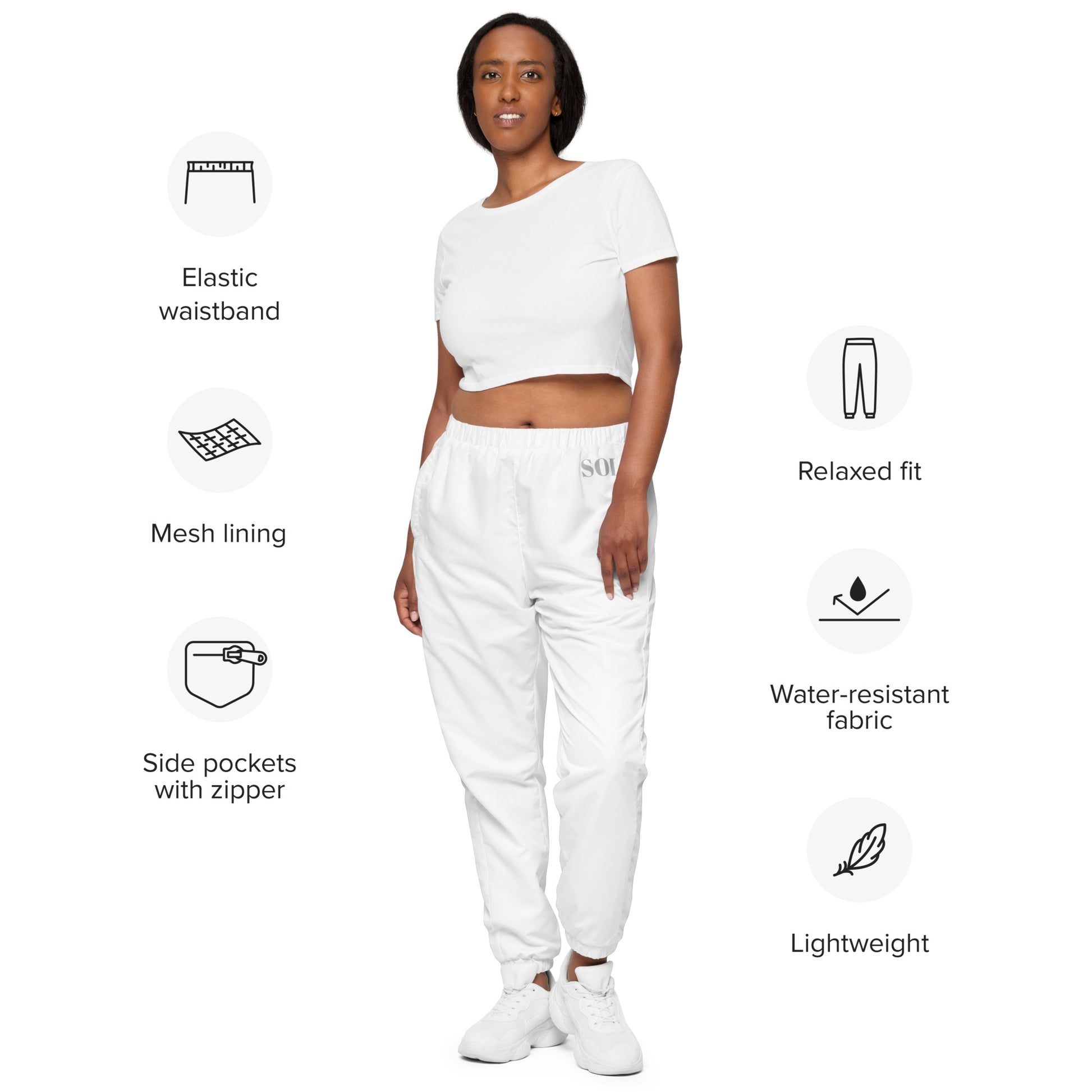 SOL Unisex Track Pants in White — front view