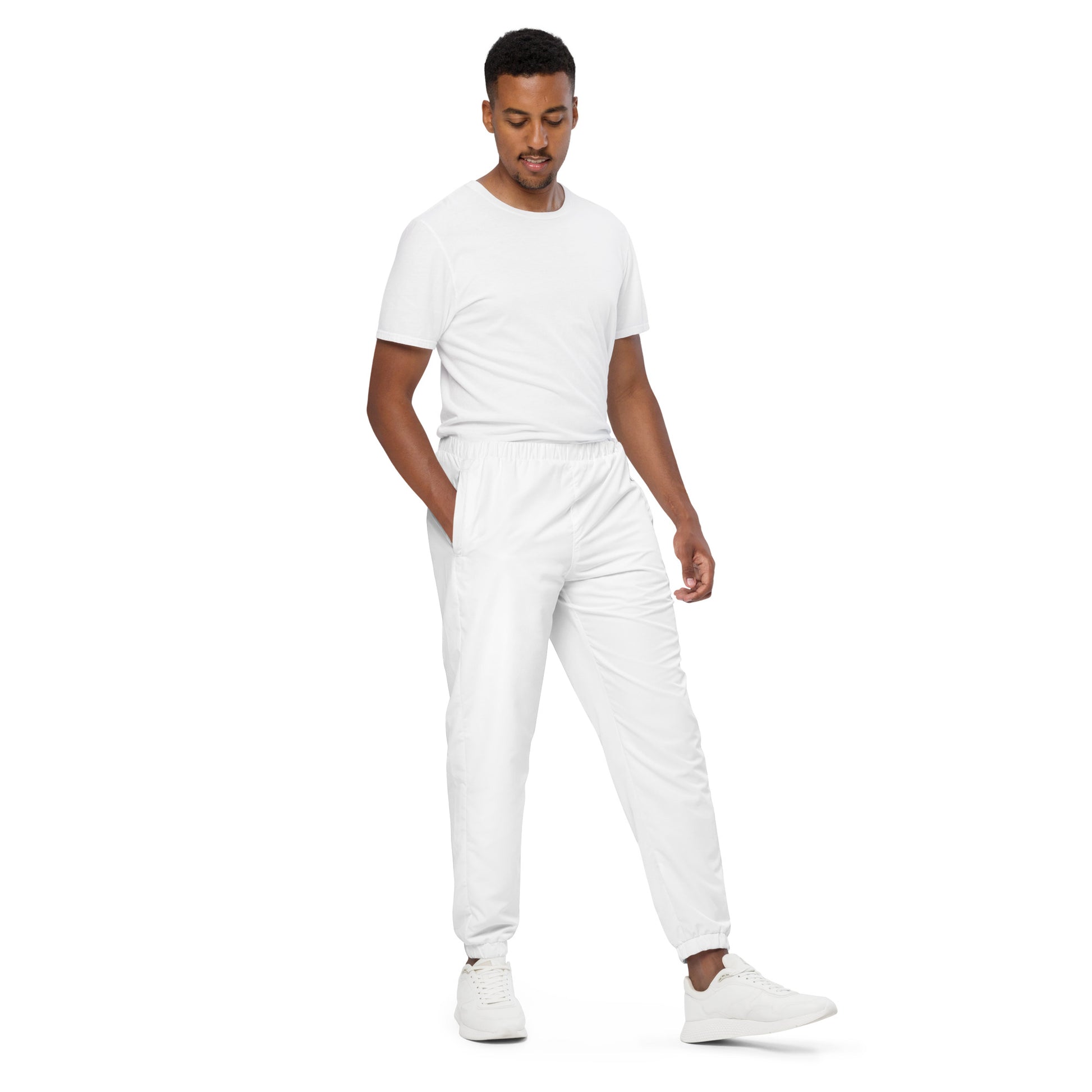 SOL Unisex Track Pants in White — angled front view