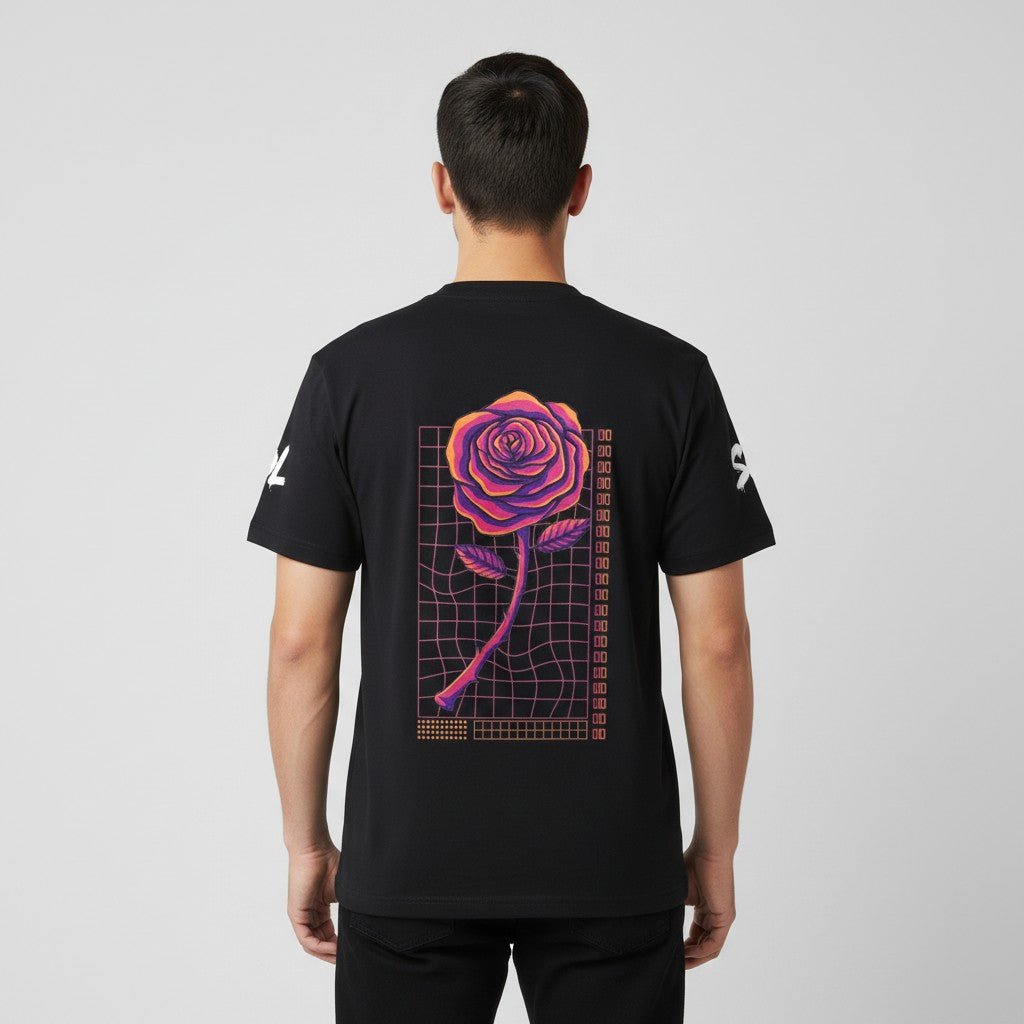 Model wearing black SOL Daybreak Lightweight Tee, back view showing colorful rose and geometric artwork