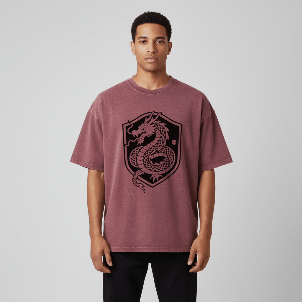 Model wearing the red SOL Frostline Oversized Tee with black dragon shield chest graphic