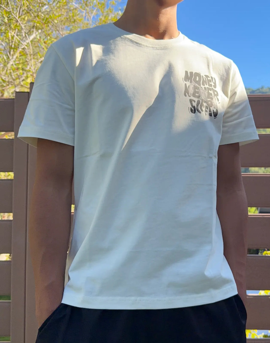 Money Never Sleeps Graphic Tee