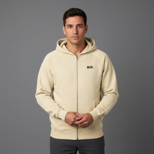 Model wearing apricot SOL Overcast Zip Hoodie with black chest logo, front view
