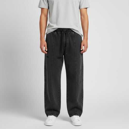 Model wearing black SOL Whiteout Drawstring Pants, front view showing relaxed fit and drawstring waist